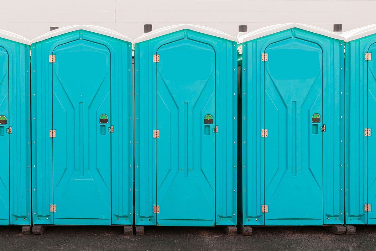 Industrial portable restroom units at a plant in Lewiston, Maine